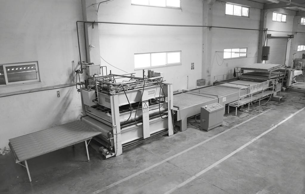 is as follow; the veneers are cut by guillotine in accordance with dimensions of the panels which they will be pressed on.