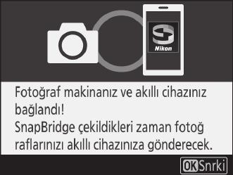 8 Fotoğraf makinesi/akıllı cihaz: Eşleştirmeyi tamamlayın. Fotoğraf makinesi: Sağdaki mesaj görüntülendiğinde J düğmesine basın. Akıllı cihaz: Sağdaki mesaj görüntülendiğinde Tamam öğesine dokunun.