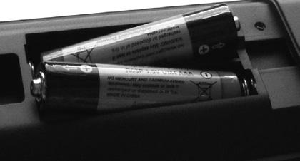 Inserting the Batteries into the Remote Lift the cover on the back of the remote gently. Insert two AAA batteries. Make sure the (+) and (-) signs match (observe correct polarity).