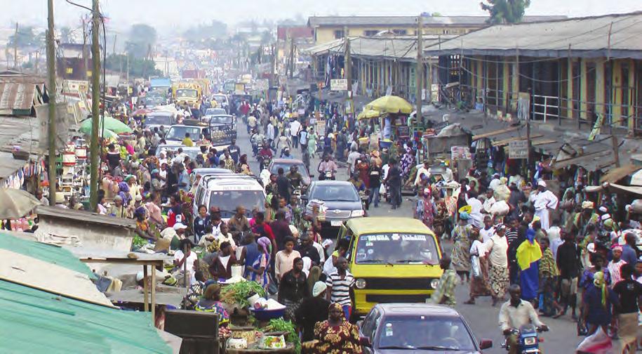 Fotoðraf 3: Nijerya dan bir görünüm (Lagos) Lagos, günümüzde 21 milyon kiþilik nüfusu ile Orta Afrika nýn en büyük þehirlerinden biridir. Baþkent ülke ortasýnda kurulan Abuja þehridir.